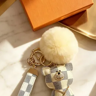 Louis Vuitton Teddy Bear Beige Black Damier Check Leather Pom-Pom Accent Phone Accessory