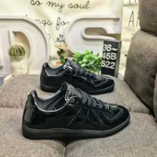 Maison Margiela Black Glossy Patent Leather Stitched Panel Construction Lifestyle Sneakers
