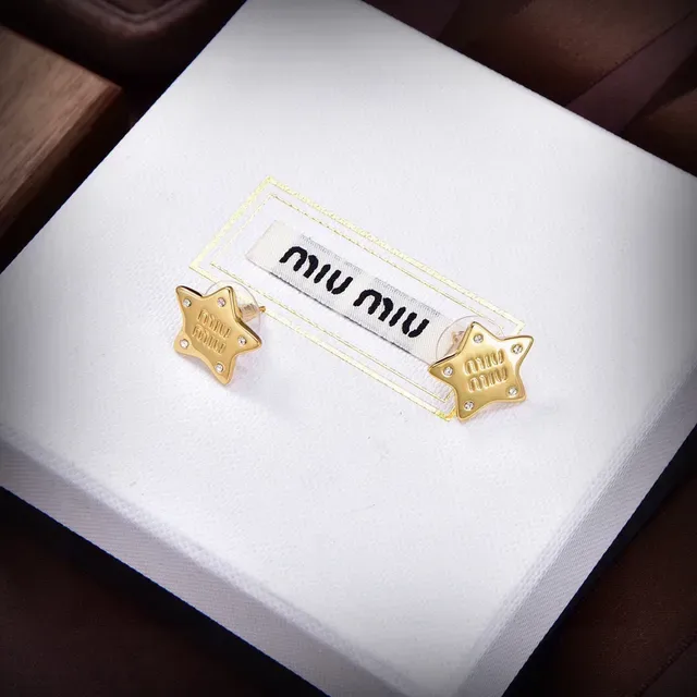Miu Miu Boucles d'oreilles clous étoile argent doré logo embossé 2