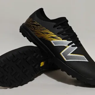 New Balance काला सोना सिंथेटिक अपर लाइटनिंग-स्ट्रोक ग्राफिक टर्फ फुटबॉल जूते