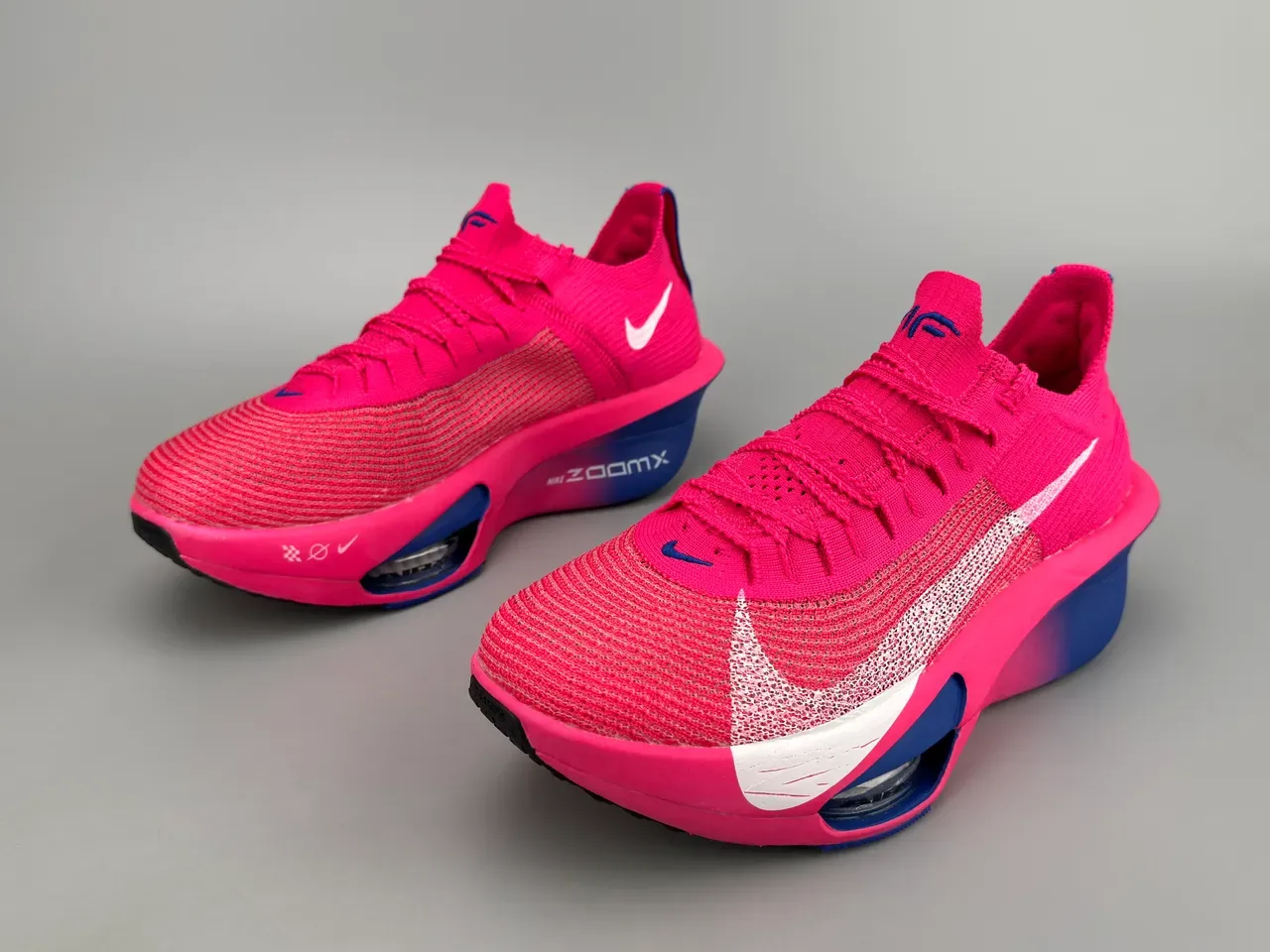 Nike Air Zoom Alphafly Chaussures de Running Haut en Tricot Rose Bleu Unité Visible 9