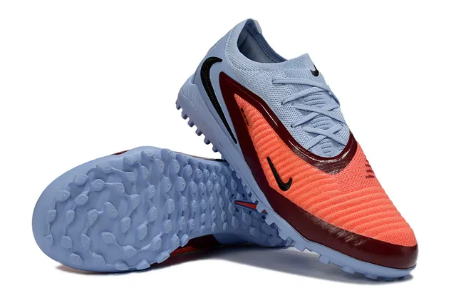 Nike أحذية كرة القدم للعشب الاصطناعي باللونين الأزرق والبرتقالي منخفضة القطع مع الجزء العلوي المحبوك وتغطية القفص الصناعي 3