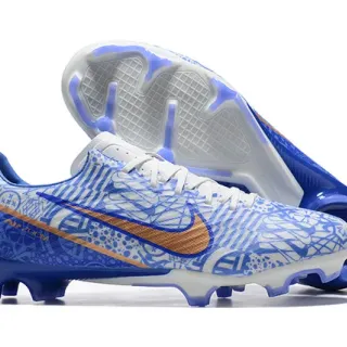 Nike Chaussures de football bleu orange à crampons moulés, tige graphique, pour terrain ferme