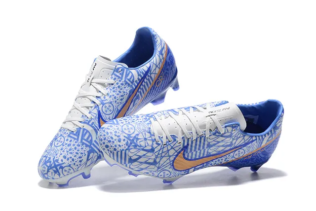 Nike Chaussures de football bleu orange à crampons moulés, tige graphique, pour terrain ferme 2