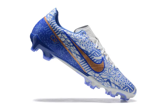 Nike Chaussures de football bleu orange à crampons moulés, tige graphique, pour terrain ferme 3