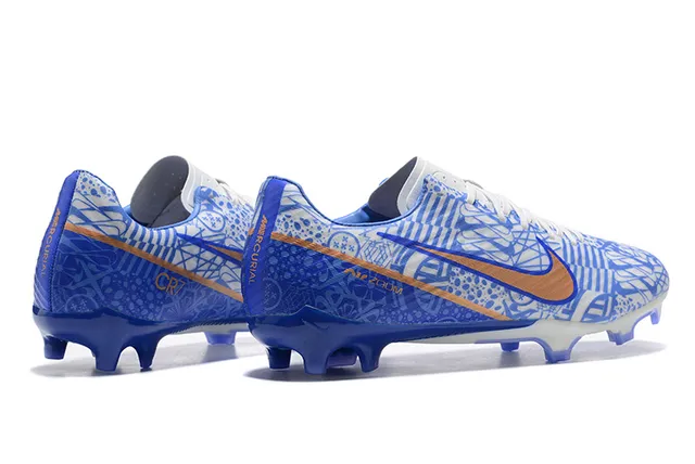 Nike Chaussures de football bleu orange à crampons moulés, tige graphique, pour terrain ferme 5