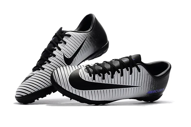 Nike Chaussures de football indoor orange noir silhouette basse ribbelée tige synthétique 4