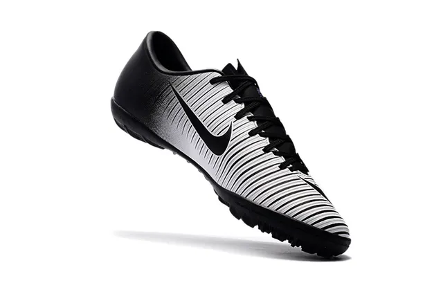 Nike Chaussures de football indoor orange noir silhouette basse ribbelée tige synthétique 5