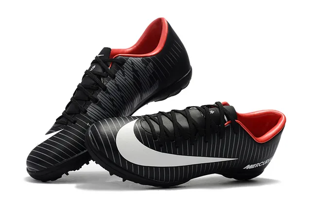 Nike Chaussures de football indoor orange noir silhouette basse ribbelée tige synthétique 14