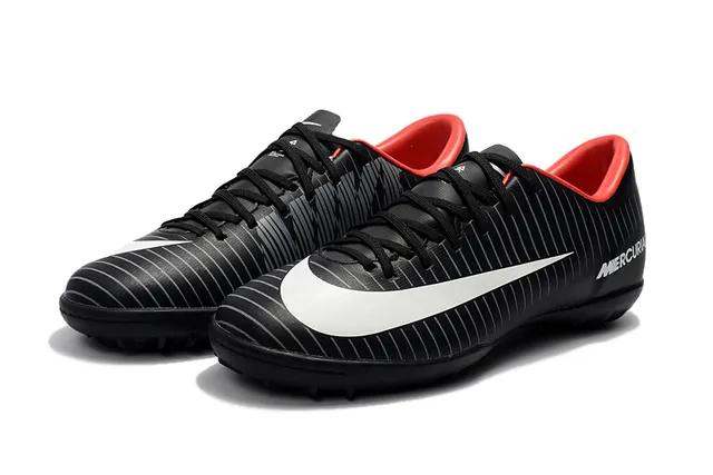 Nike Chaussures de football indoor orange noir silhouette basse ribbelée tige synthétique 20