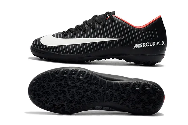 Nike Chaussures de football indoor orange noir silhouette basse ribbelée tige synthétique 21