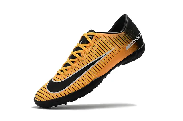 Nike Chaussures de football indoor orange noir silhouette basse ribbelée tige synthétique 24