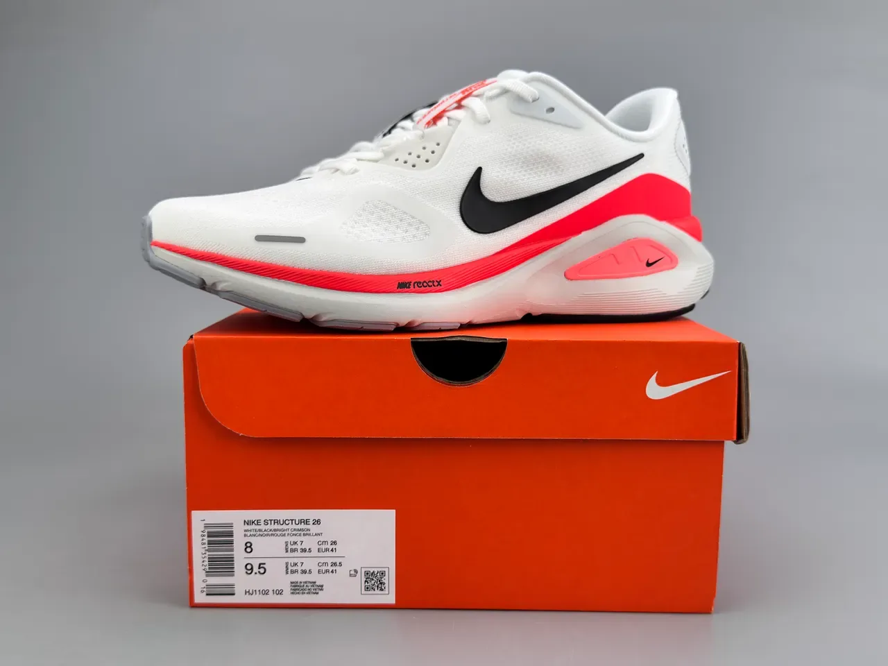 Chaussures de course Nike blanc rouge avec upper en mesh ingénierie Reactx technologie de semelle intermédiaire 2