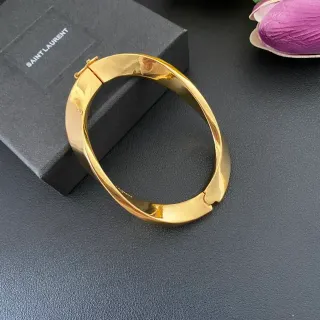 Saint Laurent चमकदार सोने का रंग हिंज वाला बैंगल ब्रेसलेट