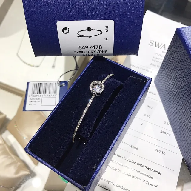 Swarovski রূপালি নেভি Pavé-Crystal ব্যাঙ্গল কেন্দ্রীয় ফুল-ইনস্পায়ার্ড মোটিফ ব্রেসলেট 9
