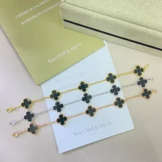 Van Cleef & Arpels Alhambra Black Stone Gold and Silver Tone Chain Bracelets