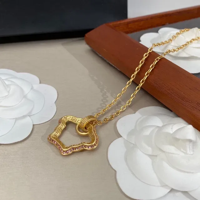 Versace Greca Odissea Gold-Tone Quatrefoil Pendant Necklace 2