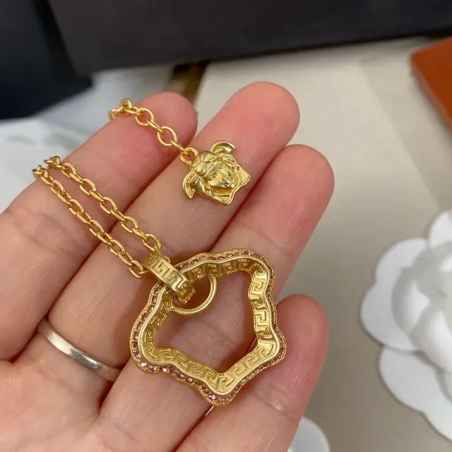 Versace Greca Odissea Gold-Tone Quatrefoil Pendant Necklace 9