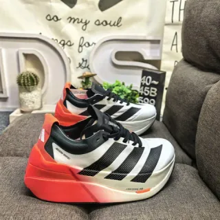 Adidas Adios Boost Chaussures de course blanches oranges sculptées dégradé milieu de semelle bande latérale à trois rayures