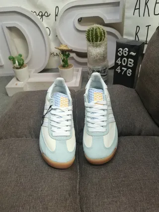 Adidas حذاء رياضي بيج أزرق ريترو ريننج سيليويت سويد ونسيج علوي أسلوب حياة 10