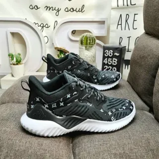 Adidas أسود أبيض منسوج علوي طباعة مونوغرام نمط حياة سنيكرز