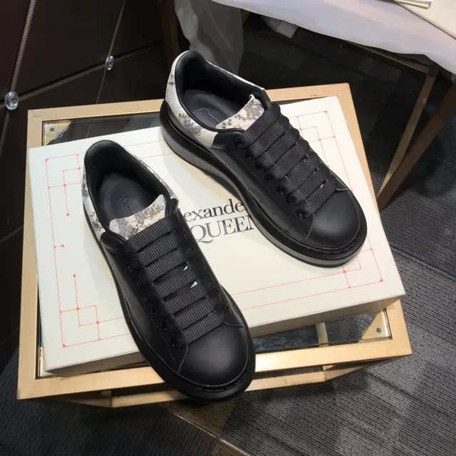 Alexander McQueen Oversized Sneaker Noir Blanc Semelle Plataforma Sangle Élastique Lacets Lifestyle Sneakers 7