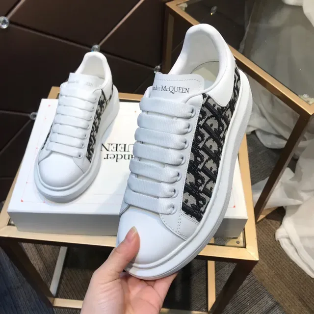 Alexander McQueen Oversized Sneaker White Black Platform Sole Monogrammed Textile Side Panel Lifestyle Sneakers 3