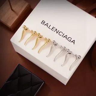 Balenciaga شكل إنسان ذهب فضة مجرد شكل بشري ظل كروي تفاصيل الرأس أقراط
