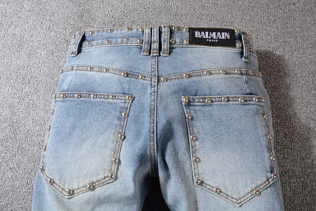 Balmain Studded Distressed Light-Wash Jeans 3
