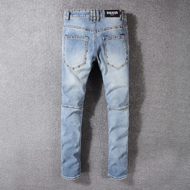 Balmain Studded Distressed Light-Wash Jeans 5