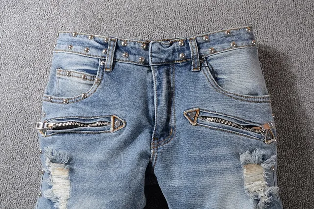 Balmain Studded Distressed Light-Wash Jeans 8