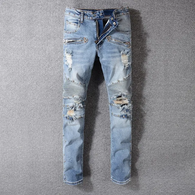 Balmain Studded Distressed Light-Wash Jeans 14