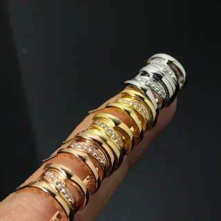 Bvlgari B.zero1 Rock स्टैक्ड पावे ट्विस्टेड बैंड अंगूठियां