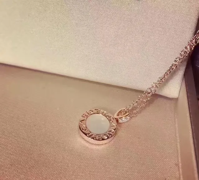 Bvlgari B.zero1 Silver Black Circular Logo-Engraved Pendant Cabochon Center Necklace 5