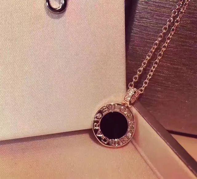 Bvlgari B.zero1 Silver Black Circular Logo-Engraved Pendant Cabochon Center Necklace 6
