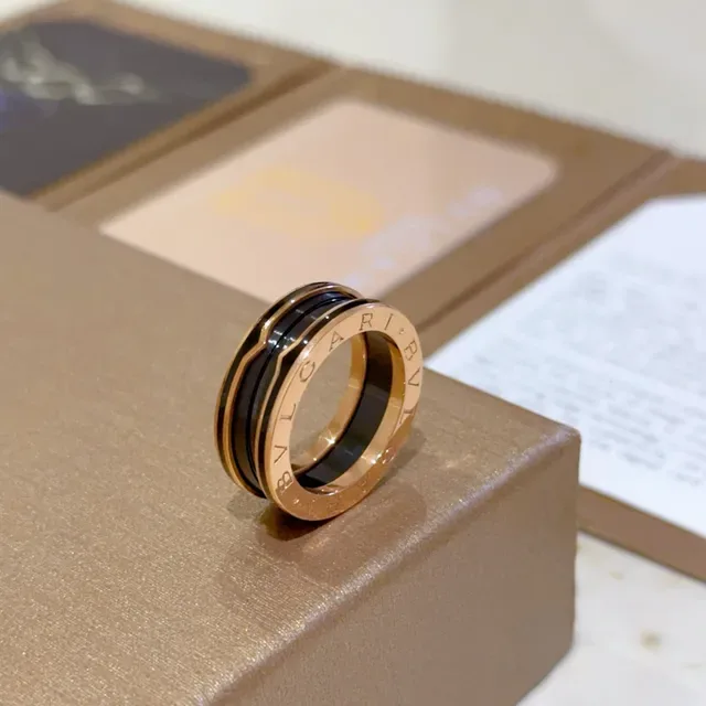 Bvlgari Anel Dourado Preto Triple-Banda Rotativo 7