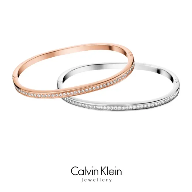 Calvin Klein পালিশড রোজ গোল্ড এঙ্গ্রেভড ব্যান্ড রিং 10