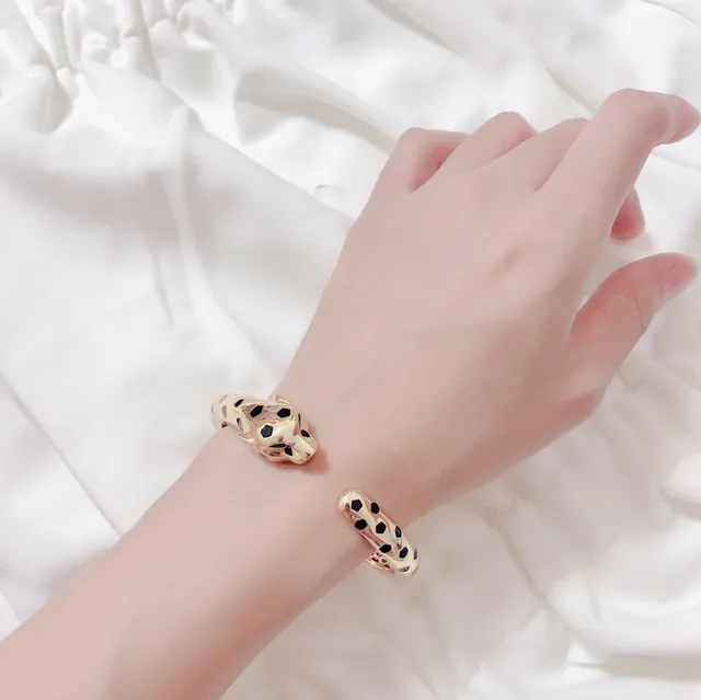 Cartier Panthère সোনা এবং কালো এনামেল প্যান্থার হেড ব্রেসলেট 8