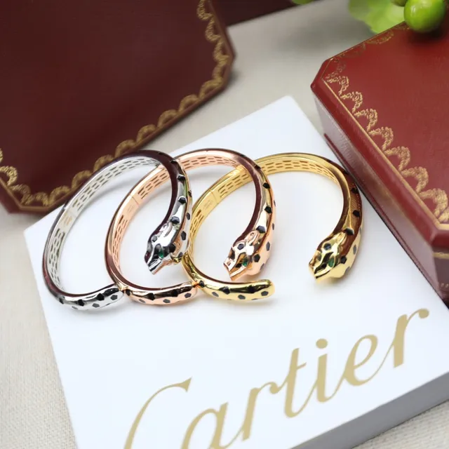 Cartier Panthère সোনা এবং কালো এনামেল প্যান্থার হেড ব্রেসলেট 9