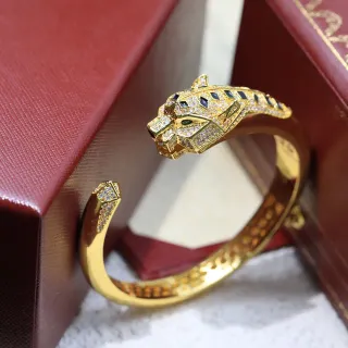 سوار Cartier Panthère ذهبي مع الماس والأونيكس برأس النمر