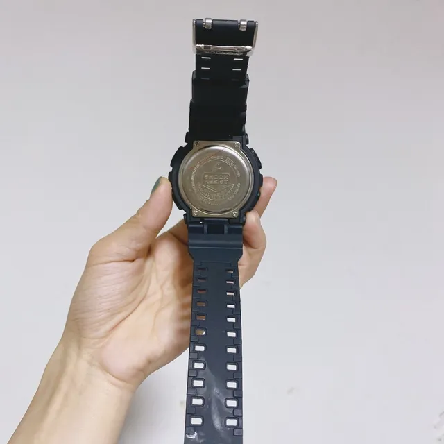 Casio G-Shock GA-100 काली और सोने की खेल घड़ी 5