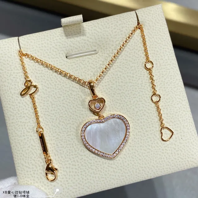 Chopard Happy Hearts قلائد الماس والأحجار الكريمة على شكل قلب 6