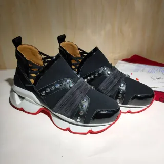 Christian Louboutin Sneakers chunky noires rouges multi-bandes avec embellissement rivet sur la tige