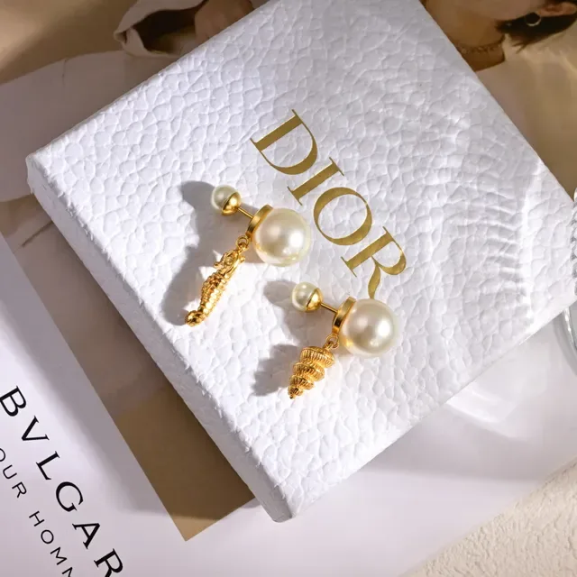 Dior Asymmetrical Pearl and Gold Seahorse Shell Earrings 2