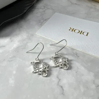 Dior Boucles d'oreilles pendantes avec cristaux et logo Dior Oblique