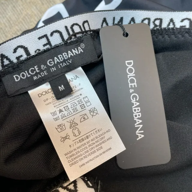 Dolce & Gabbana मोनोग्राम-प्रिंट स्विमसूट काला सफेद V-नेक स्विमवियर 2