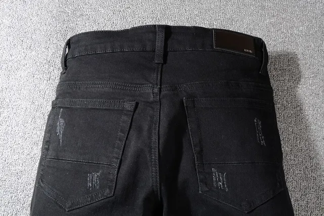 Jeans noirs distressed avec patchwork et rivets 5