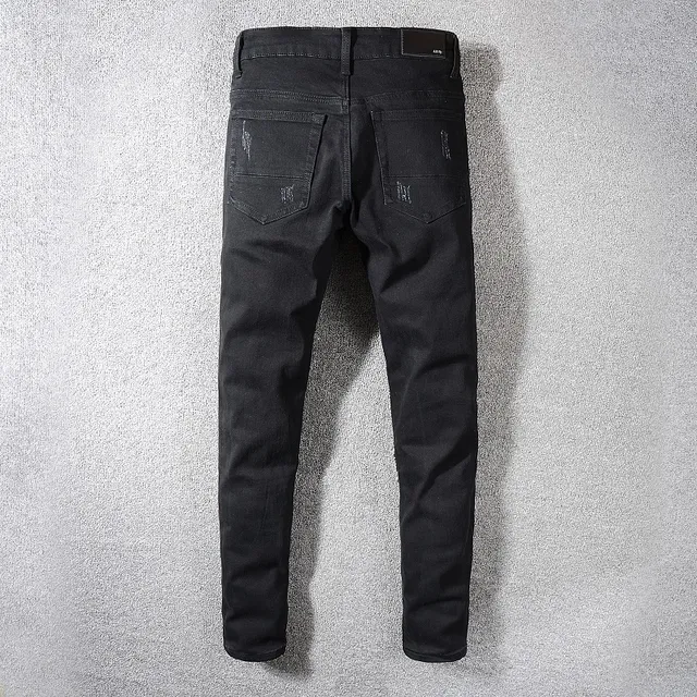 Jeans noirs distressed avec patchwork et rivets 6