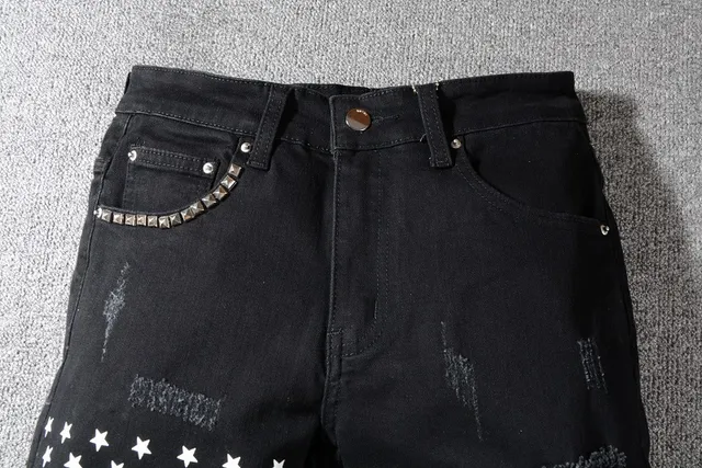 Jeans noirs distressed avec patchwork et rivets 13