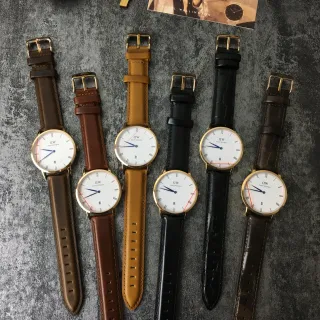 Daniel Wellington भूरी सोने की न्यूनतम पतली केस क्वार्ट्ज घड़ी